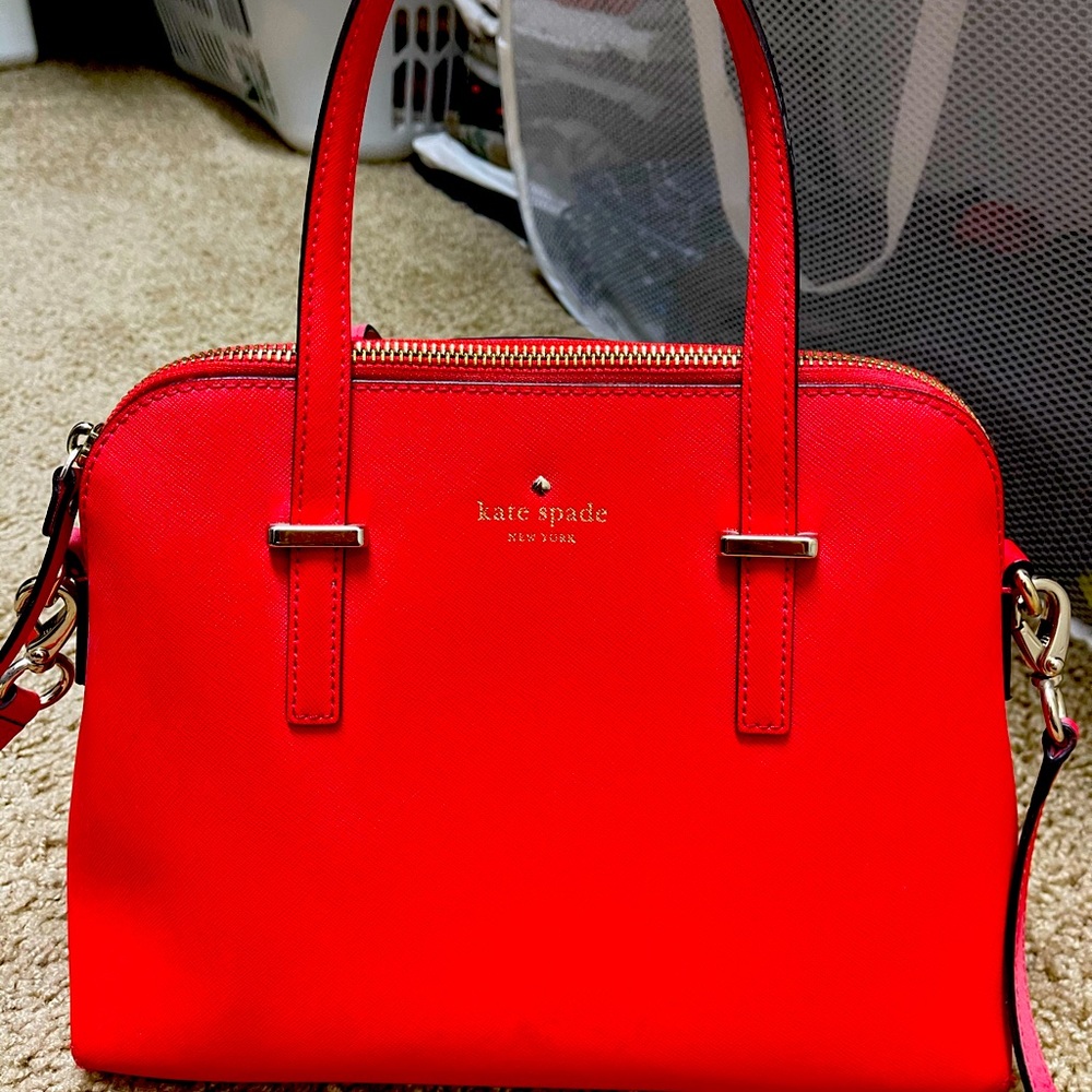 Kate spade used. It’s still excellent condition and I am selling it for $95